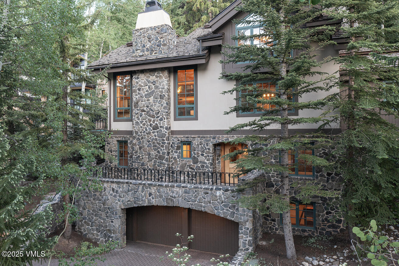 416 West Forest Road, Unit A Vail, CO 81657 - Photo 6 of 19 an aerial view of a house with a yard and garage