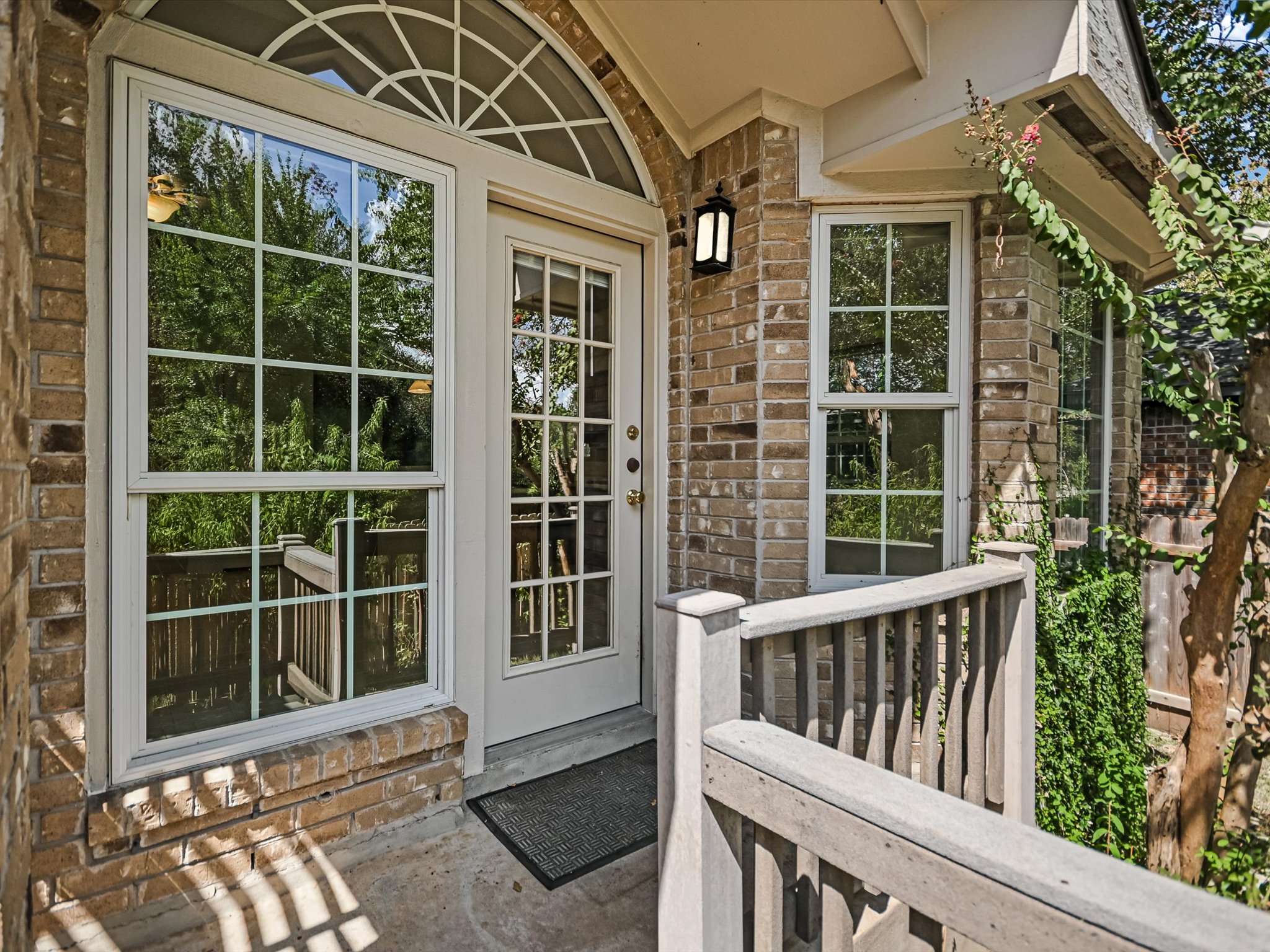 10817 Redmond Road Austin, TX 78739 - Photo 16 of 21 Classic brick masonry and mature landscaping gives that classic suburban vibe that makes you feel at home.