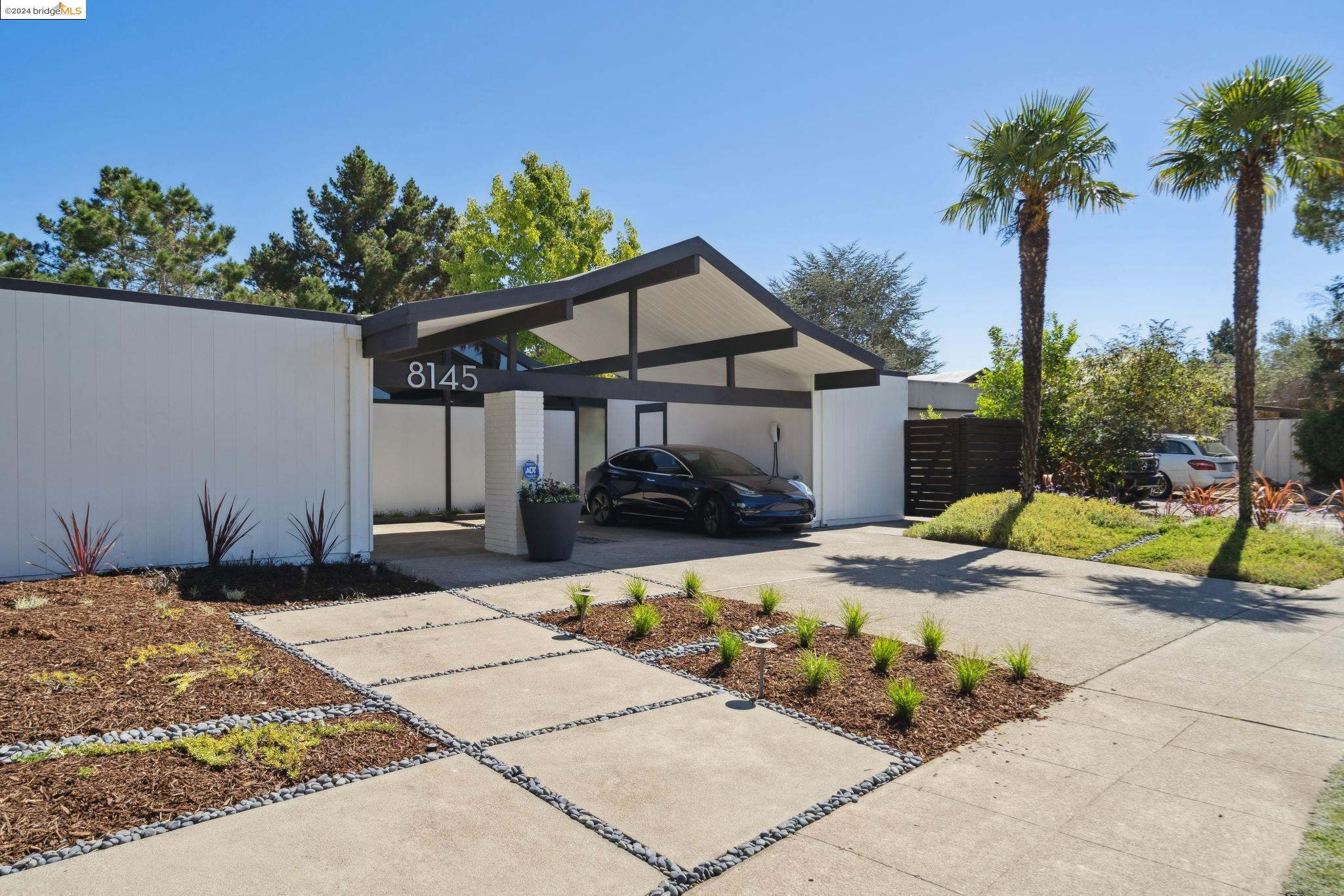 8145 Phaeton Drive Oakland, CA 94605 - Photo 1 of 1 a view of a backyard of the house