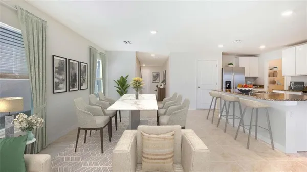 a living room with furniture and a table