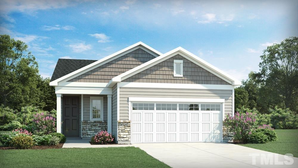 202 Maroon Court, Unit 326 Raleigh, NC 27610 - Photo 1 of 1 a front view of a house with a yard