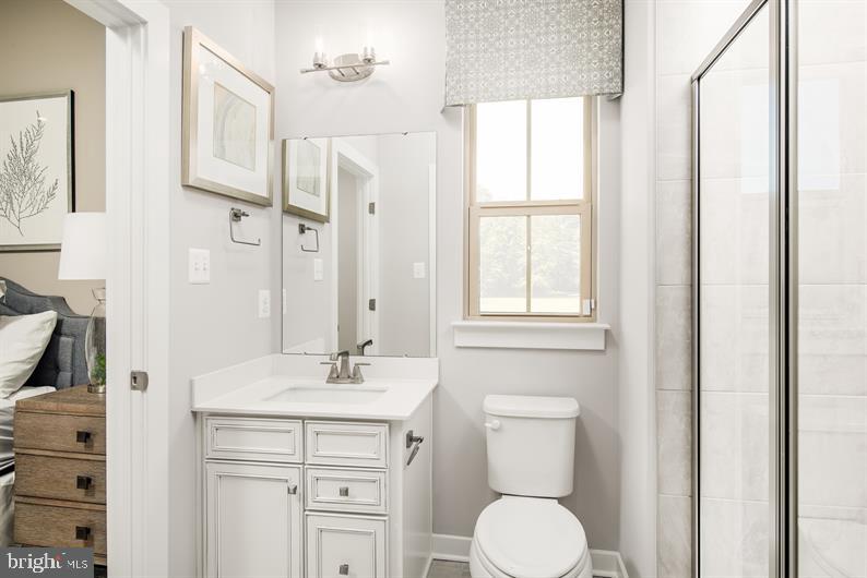 334 Ruffian Rd Camp Hill Camp Hill, PA 17011 - Photo 11 of 24 a bathroom with a toilet sink and mirror
