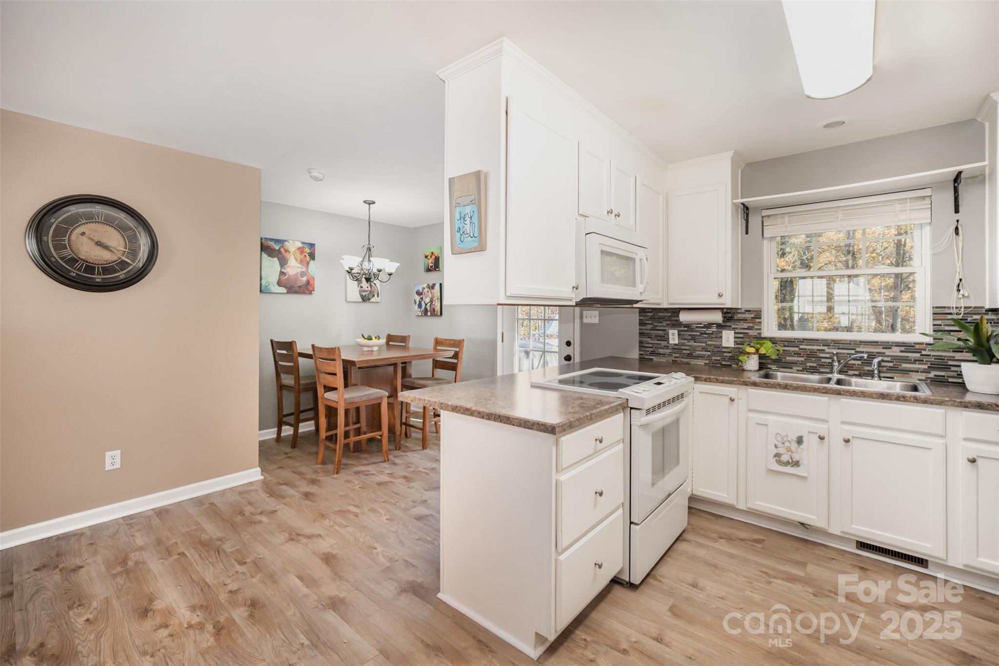 522 Kittiewake Lane Clover, SC 29710 - Photo 14 of 33 a kitchen with a sink and cabinets