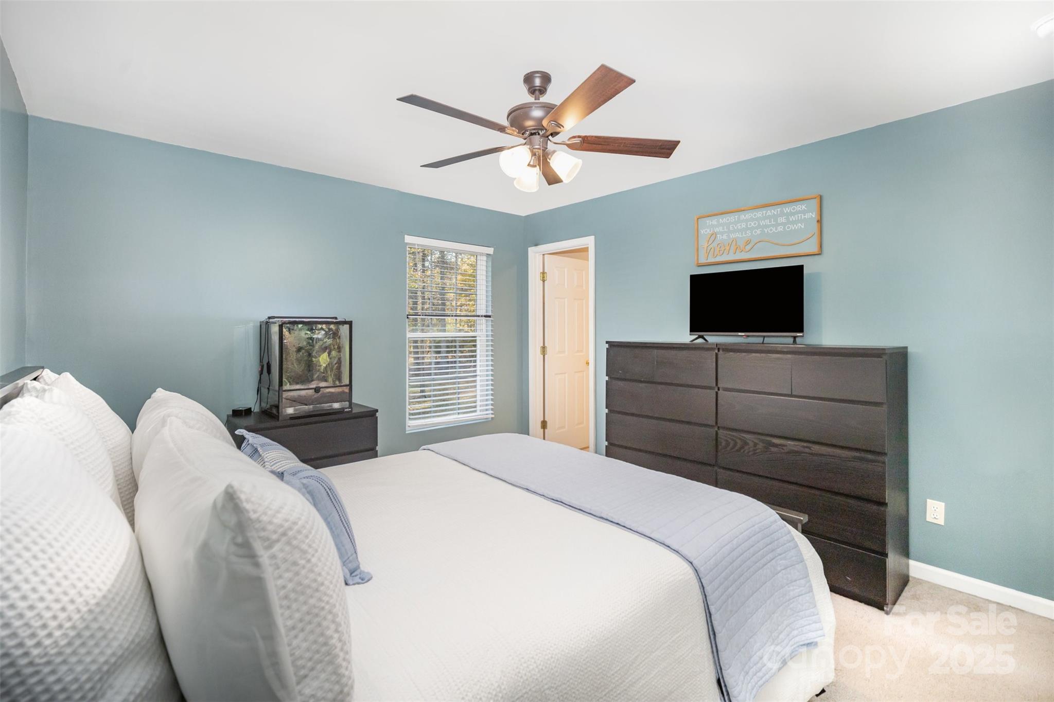 522 Kittiewake Lane Clover, SC 29710 - Photo 17 of 33 a bedroom with a bed and a flat screen tv