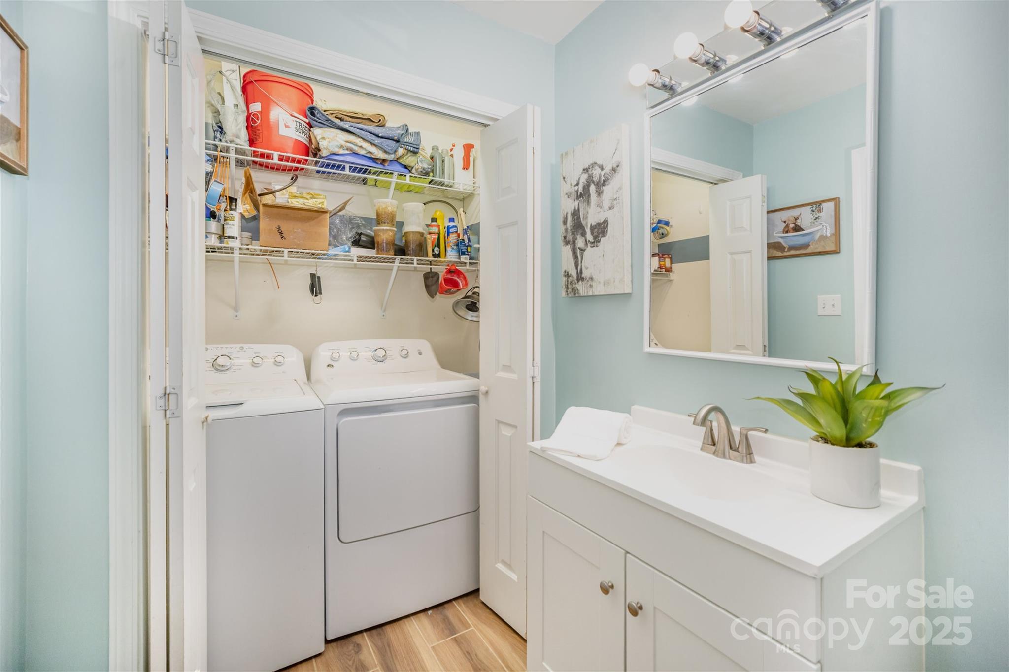 522 Kittiewake Lane Clover, SC 29710 - Photo 25 of 33 a utility room with cabinets washer and dryer