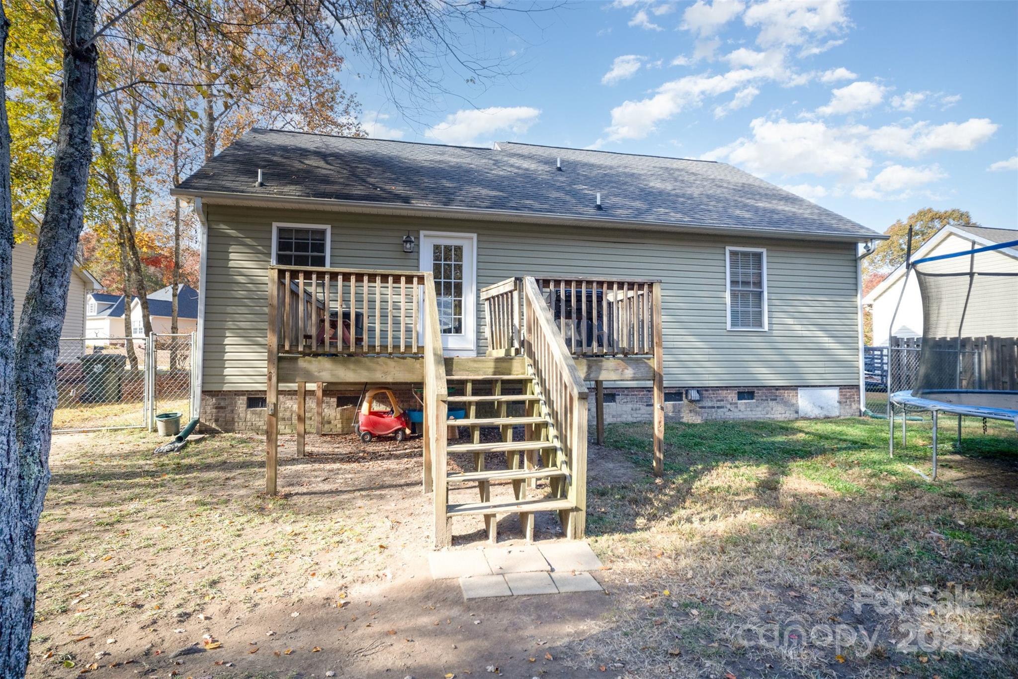 522 Kittiewake Lane Clover, SC 29710 - Photo 28 of 33 a view of a house with a yard balcony and fire pit