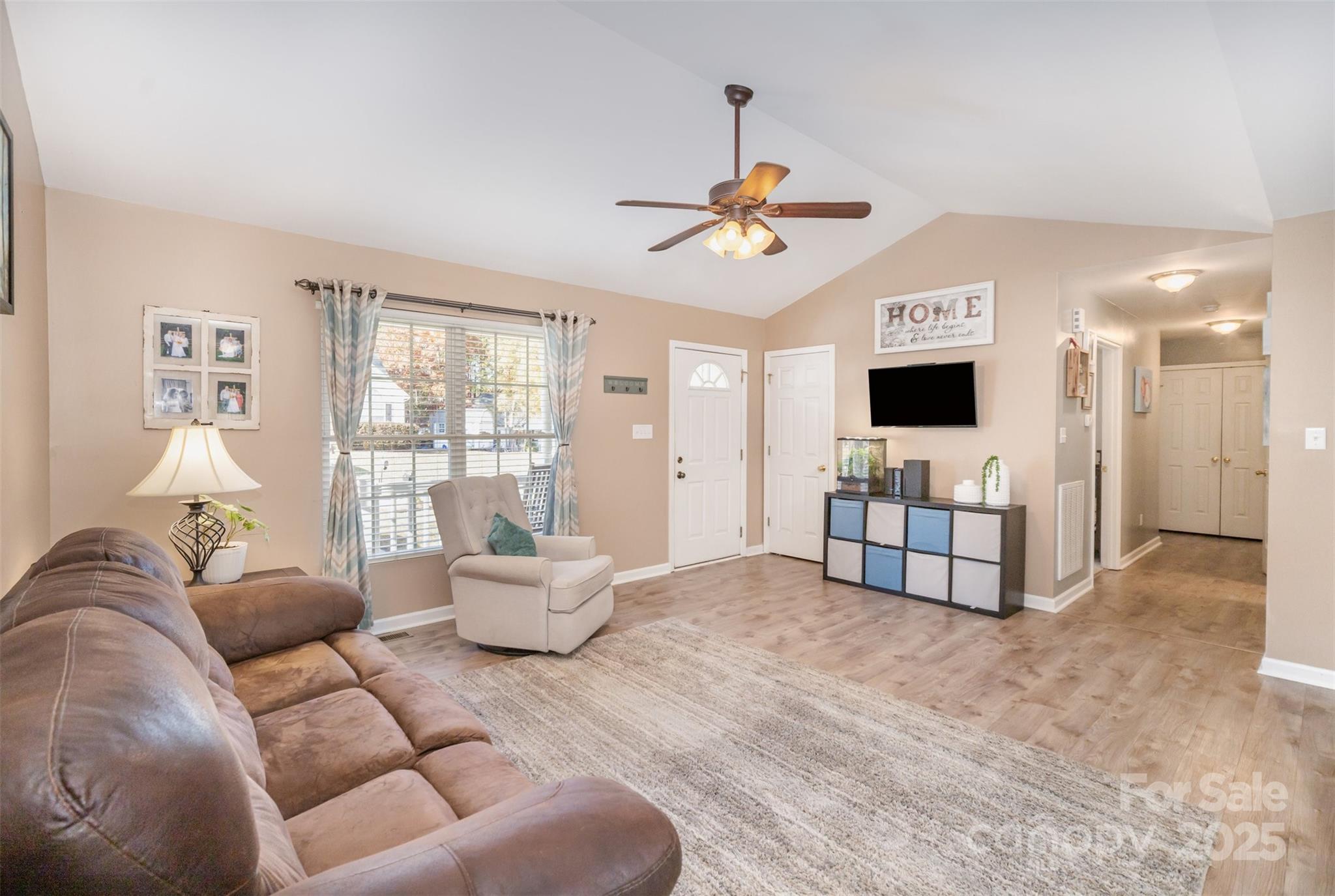 522 Kittiewake Lane Clover, SC 29710 - Photo 7 of 33 a living room with furniture and a flat screen tv
