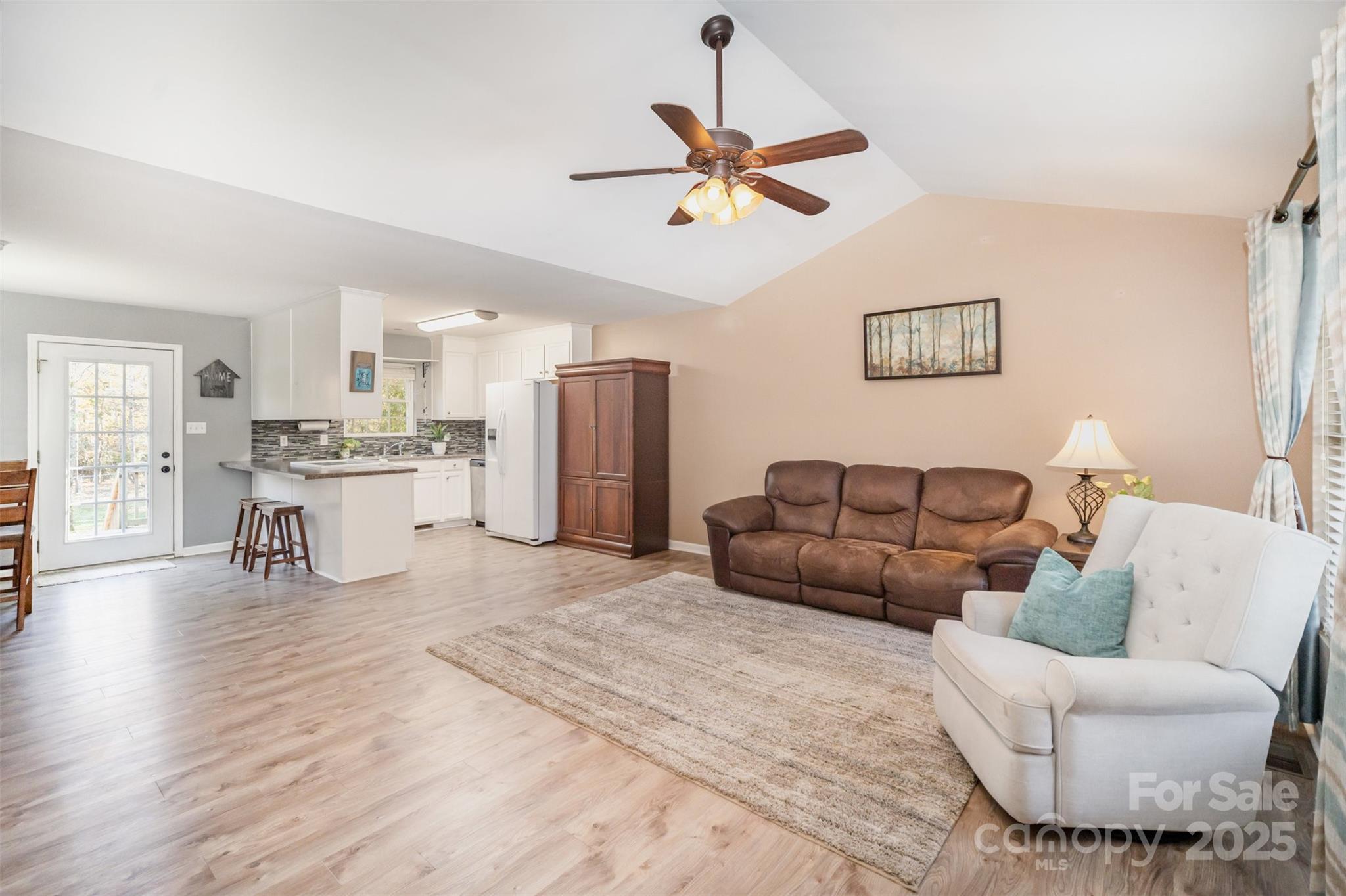 522 Kittiewake Lane Clover, SC 29710 - Photo 8 of 33 a living room with furniture and kitchen view
