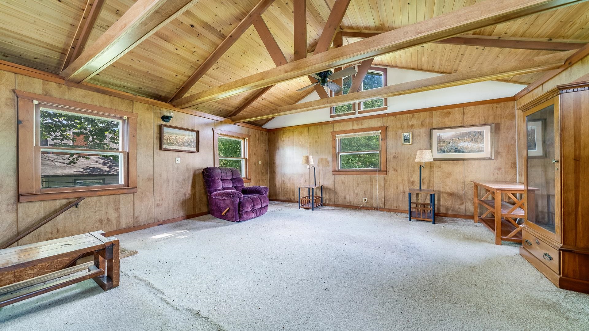 2811 South Brooks Island Road Oregon, IL 61061 - Photo 5 of 33 a living room with furniture gym equipment and a window