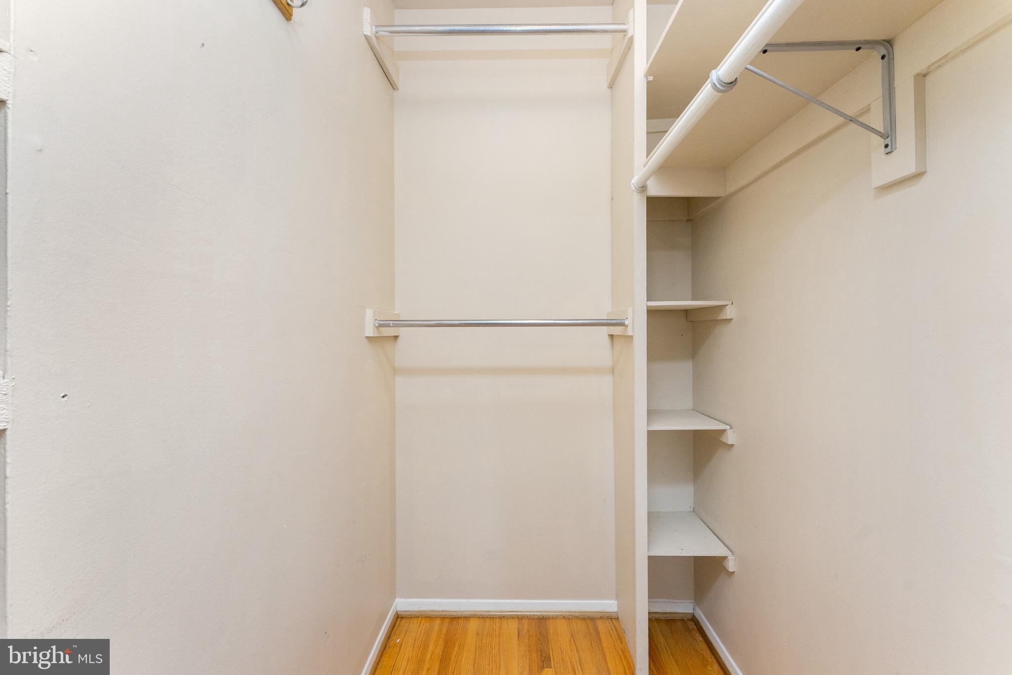 7013 Galgate Drive Springfield, VA 22152 - Photo 12 of 57 PRIMARY WALK-IN CLOSET WITH SHELVING