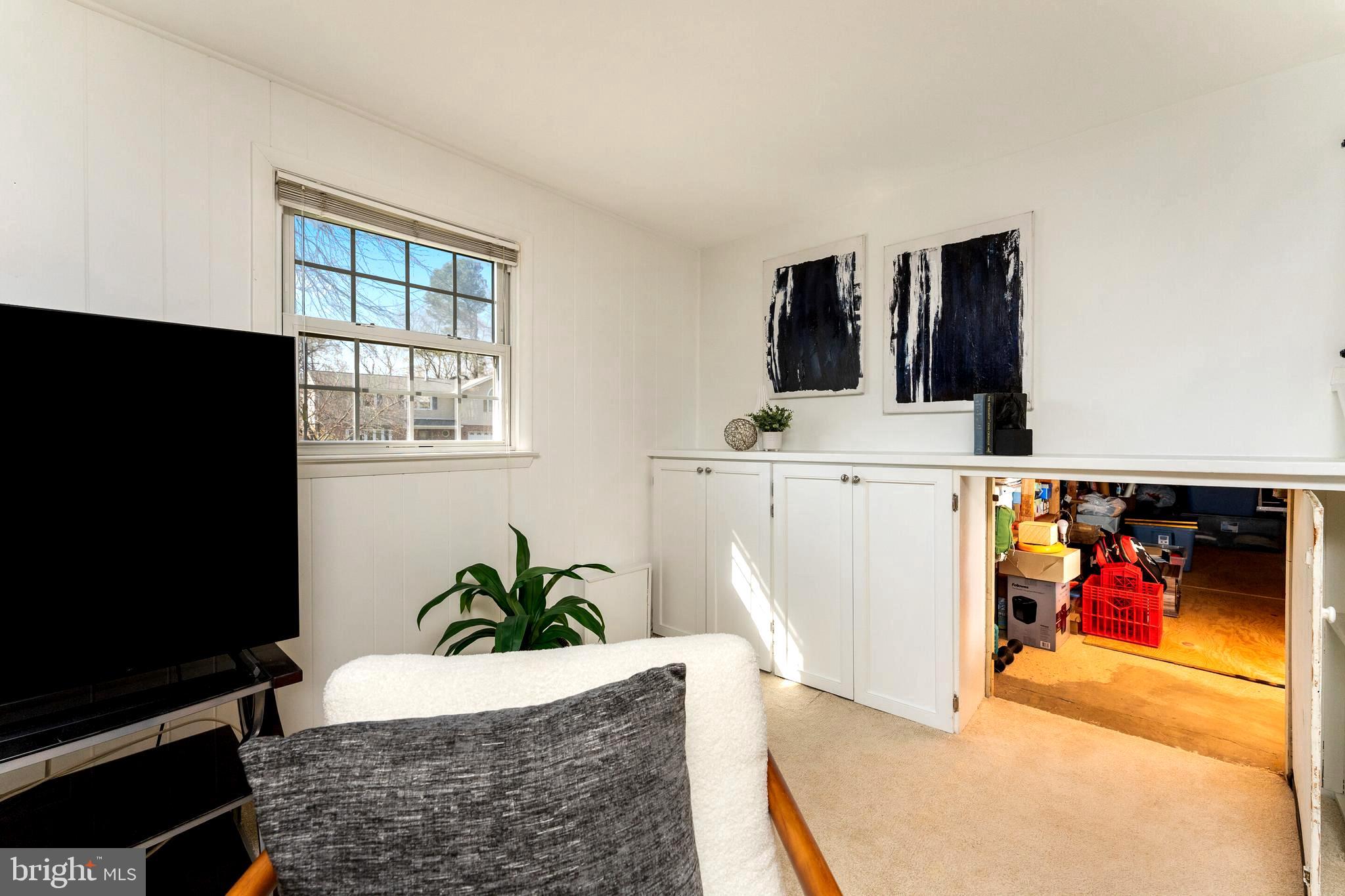 7013 Galgate Drive Springfield, VA 22152 - Photo 20 of 57 FAMILY ROOM WORK AREA W/CRAWLSPACE ACCESS OPEN