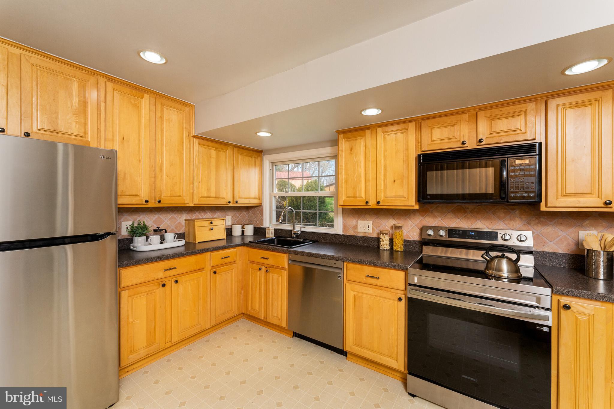 7013 Galgate Drive Springfield, VA 22152 - Photo 5 of 57 KITCHEN WINDOW/SINK VIEW & RECESSED LIGHTING!