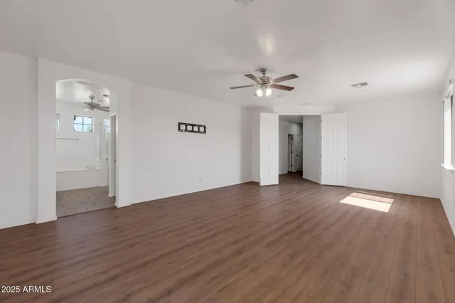 a bathroom with a bathtub and a sink