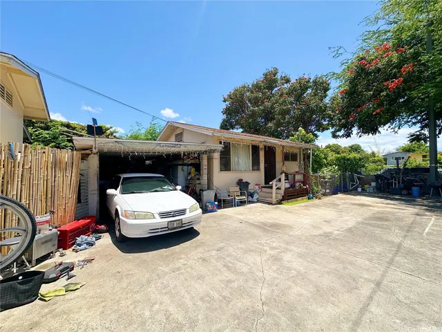 a car parked in front of a house