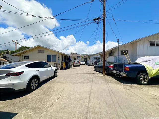 a cars parked in front of a building