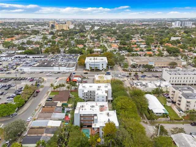 an aerial view of a city with lots of residential buildings