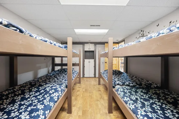 a kitchen with a stove a sink a refrigerator and window