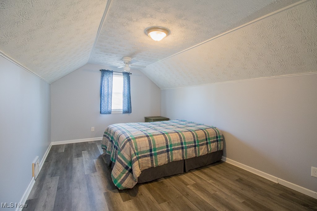 23640 Hartland Road Euclid, OH 44123 - Photo 22 of 28 Second floor bedroom is large with new luxury vinyl flooring