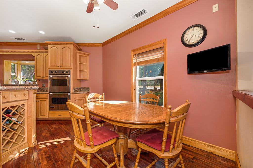 701 Sawmill Road Alta, CA 95701 - Photo 15 of 53 a dining room with furniture and window