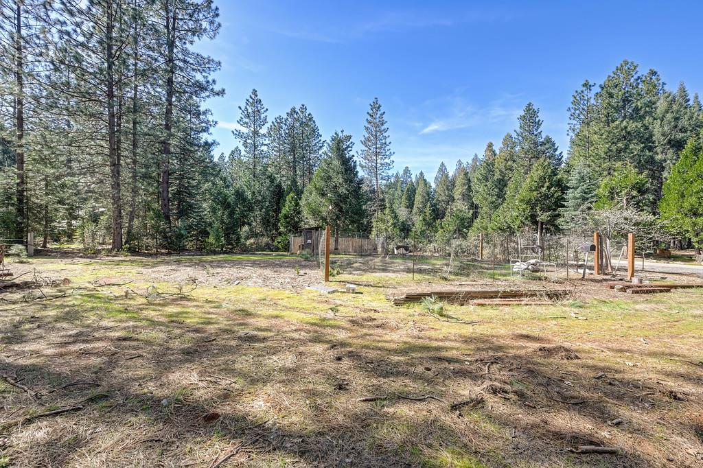 701 Sawmill Road Alta, CA 95701 - Photo 51 of 53 a view of a swimming pool with an outdoor space and seating area