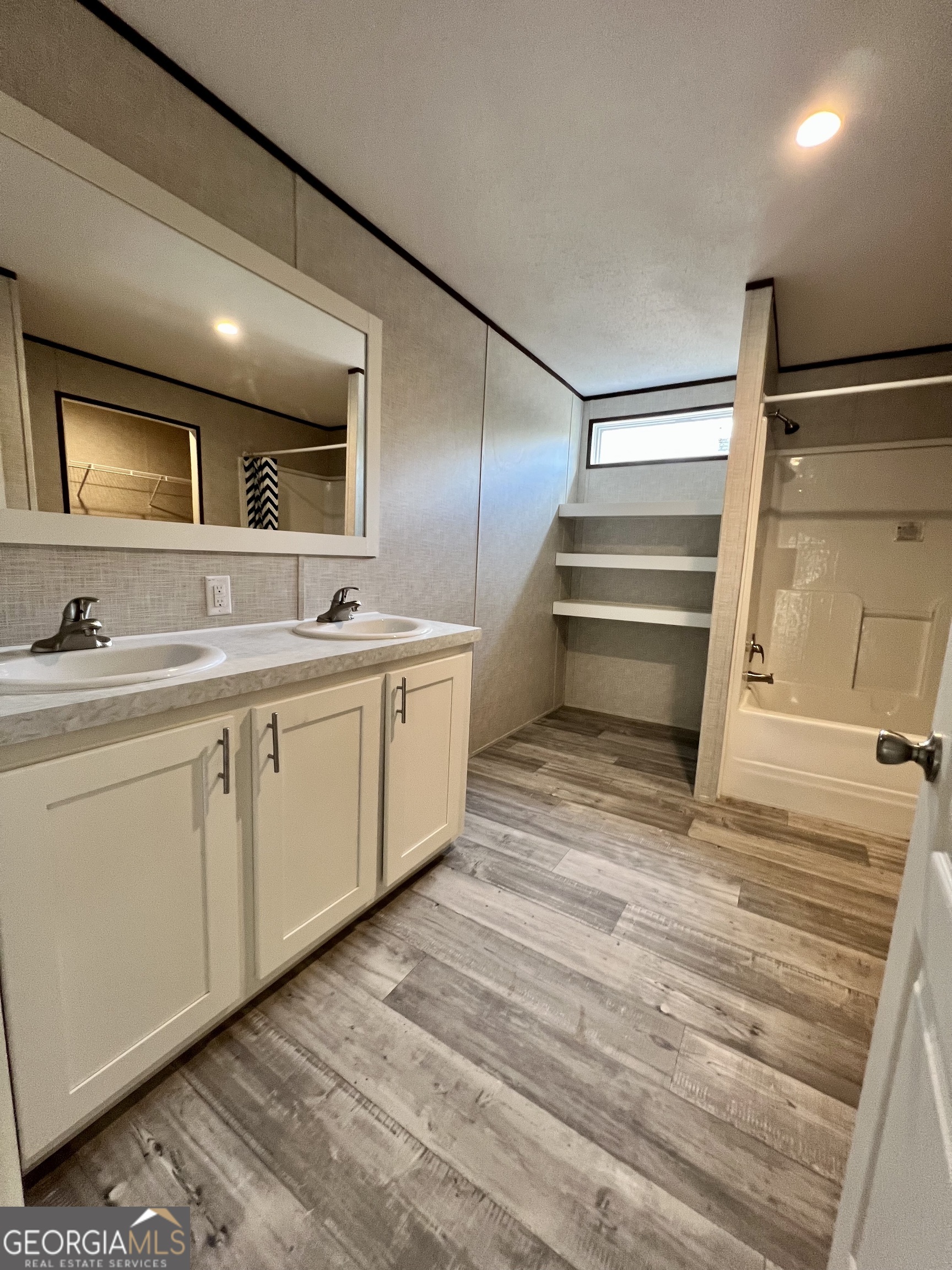223 Pelican Road Woodbine, GA 31569 - Photo 5 of 18 a kitchen with a sink and cabinets