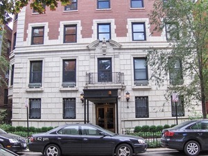 a view of a car parked in front of a building