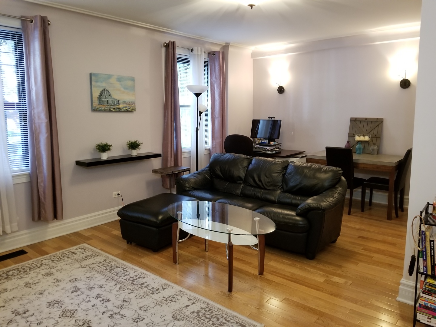 433 West Briar Place, Unit 1D Chicago, IL 60657 - Photo 2 of 12 a living room with furniture and a wooden floor