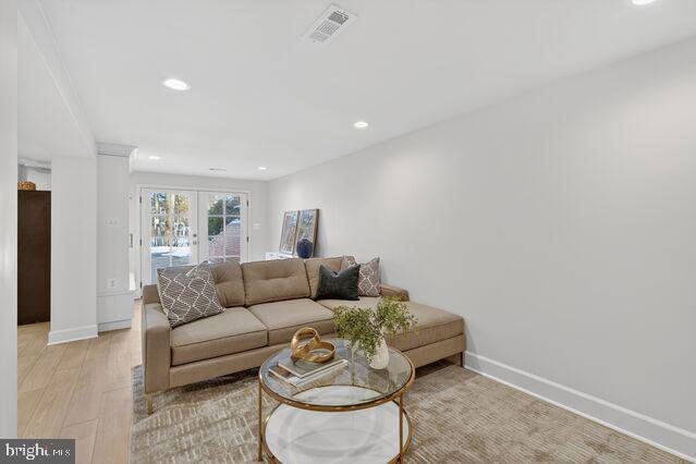 3262 Aberfoyle Place Northwest Washington, DC 20015 - Photo 51 of 64 a living room with furniture and a white wall