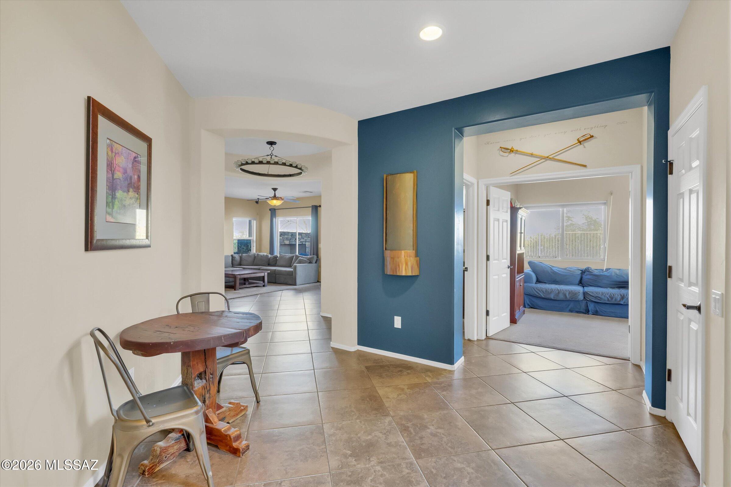 6095 South Jakemp Trail Tucson, AZ 85747 - Photo 12 of 52 a view of a livingroom with furniture and a bathroom