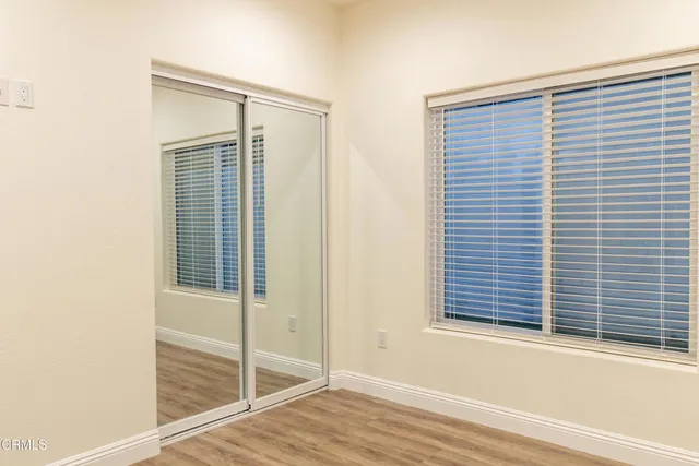 a view of a room that has a window in it