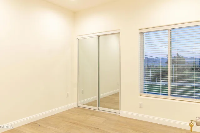 a view of a room that has a window in it