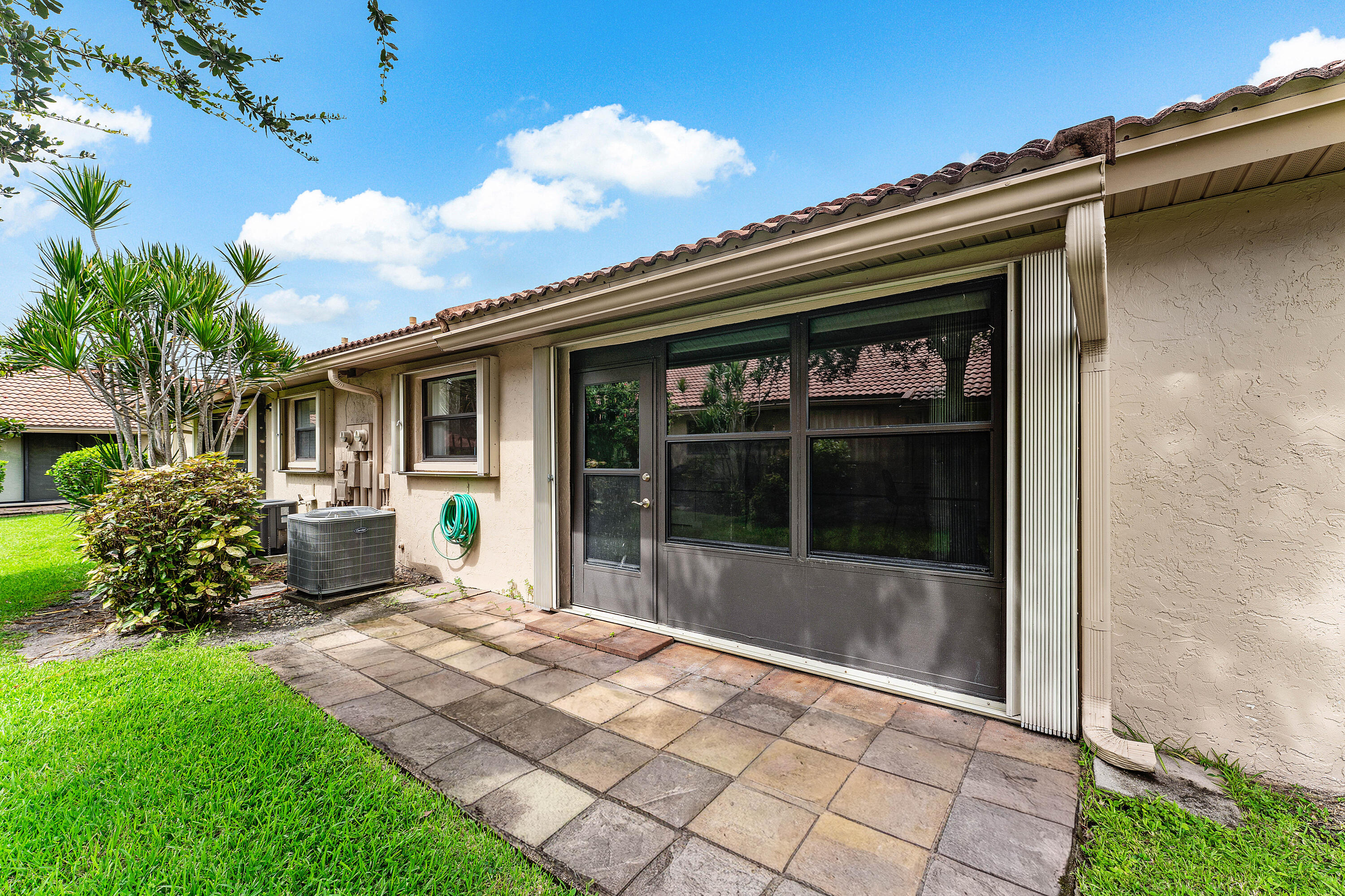 4670 Laurel Tree Road, Unit A Boynton Beach, FL 33436 - Photo 25 of 28 BACK OF VILLA