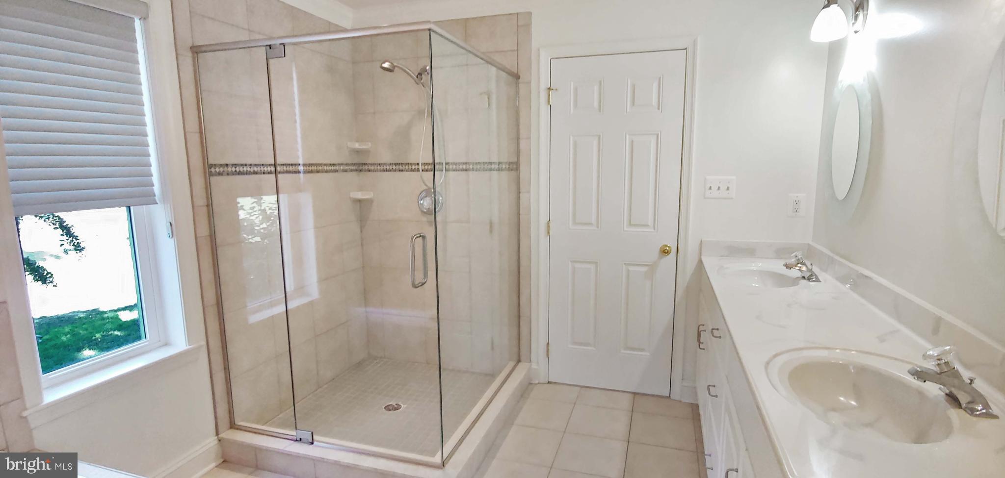 17451 Poplar Street Piney Point, MD 20674 - Photo 34 of 67 Large Tile Shower with Frameless Glass