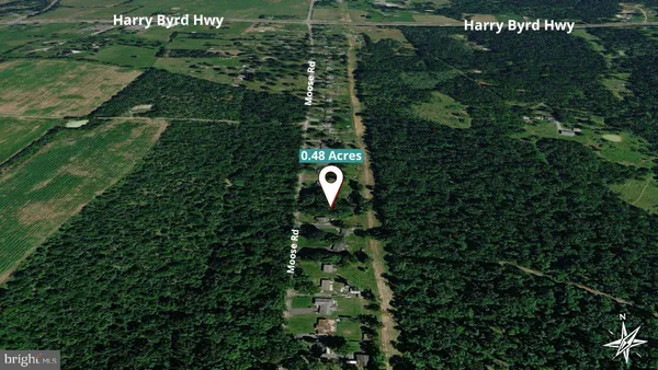 a view of a house with a tree