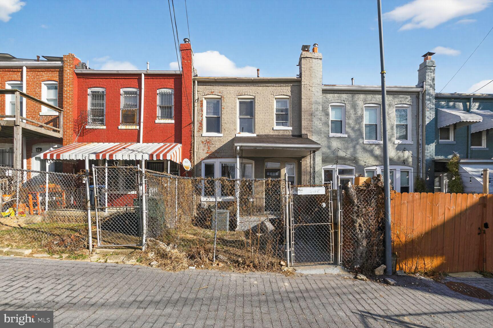 1932 Summit Place Northeast Washington, DC 20002 - Photo 24 of 26 a front view of a building with glass windows