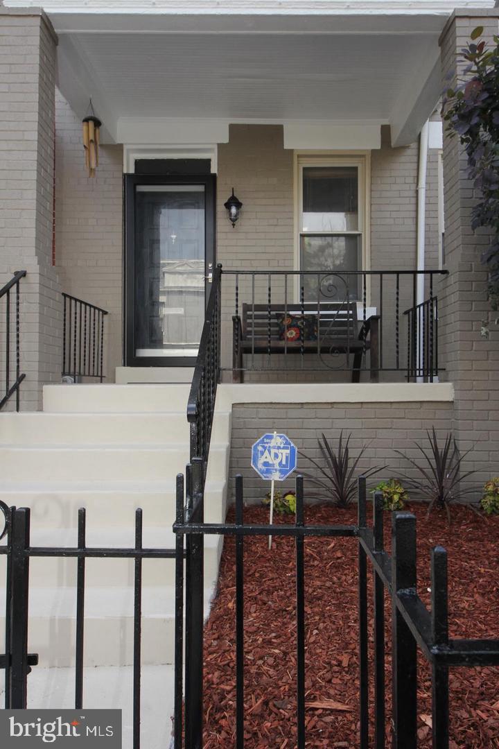 1932 Summit Place Northeast Washington, DC 20002 - Photo 3 of 26 a view of a living room and furniture