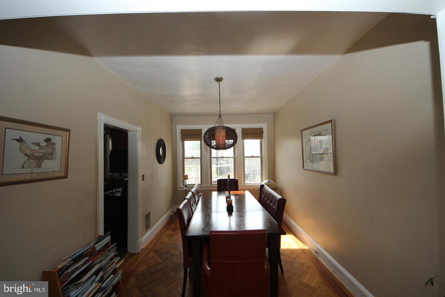 1932 Summit Place Northeast Washington, DC 20002 - Photo 9 of 26 a bedroom with a bed and a window