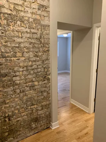 a view of a bathroom with shower