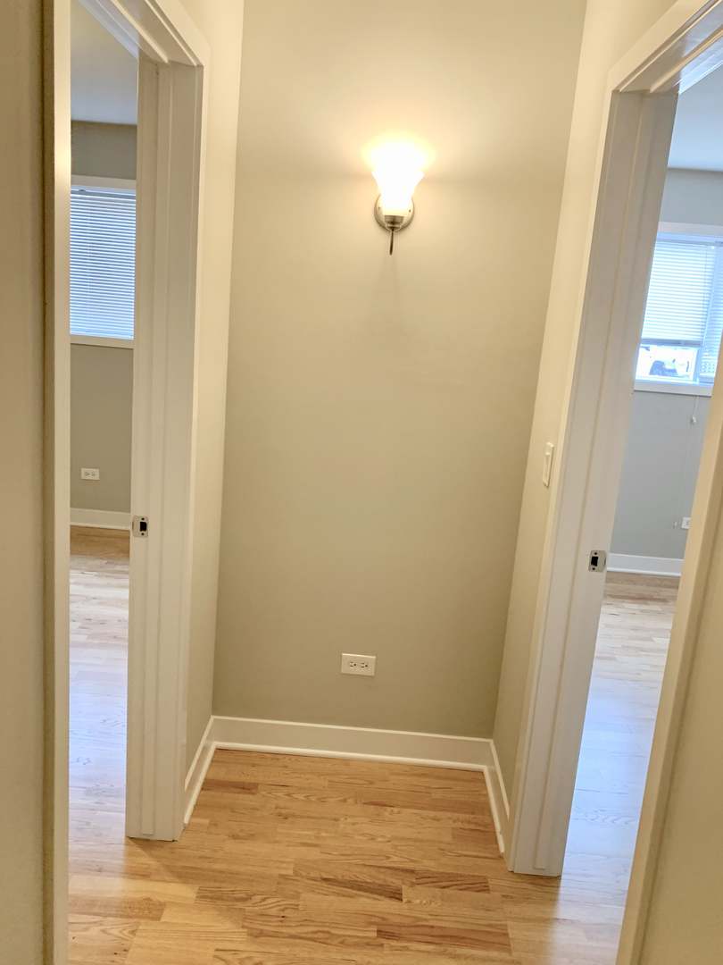 6125 North Clark Street, Unit 104 Chicago, IL 60660 - Photo 15 of 25 a view of small space with wooden floor
