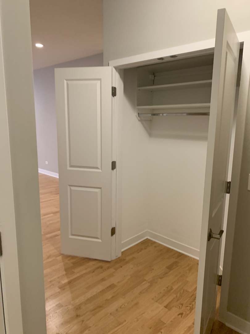 6125 North Clark Street, Unit 104 Chicago, IL 60660 - Photo 10 of 25 a view of empty room