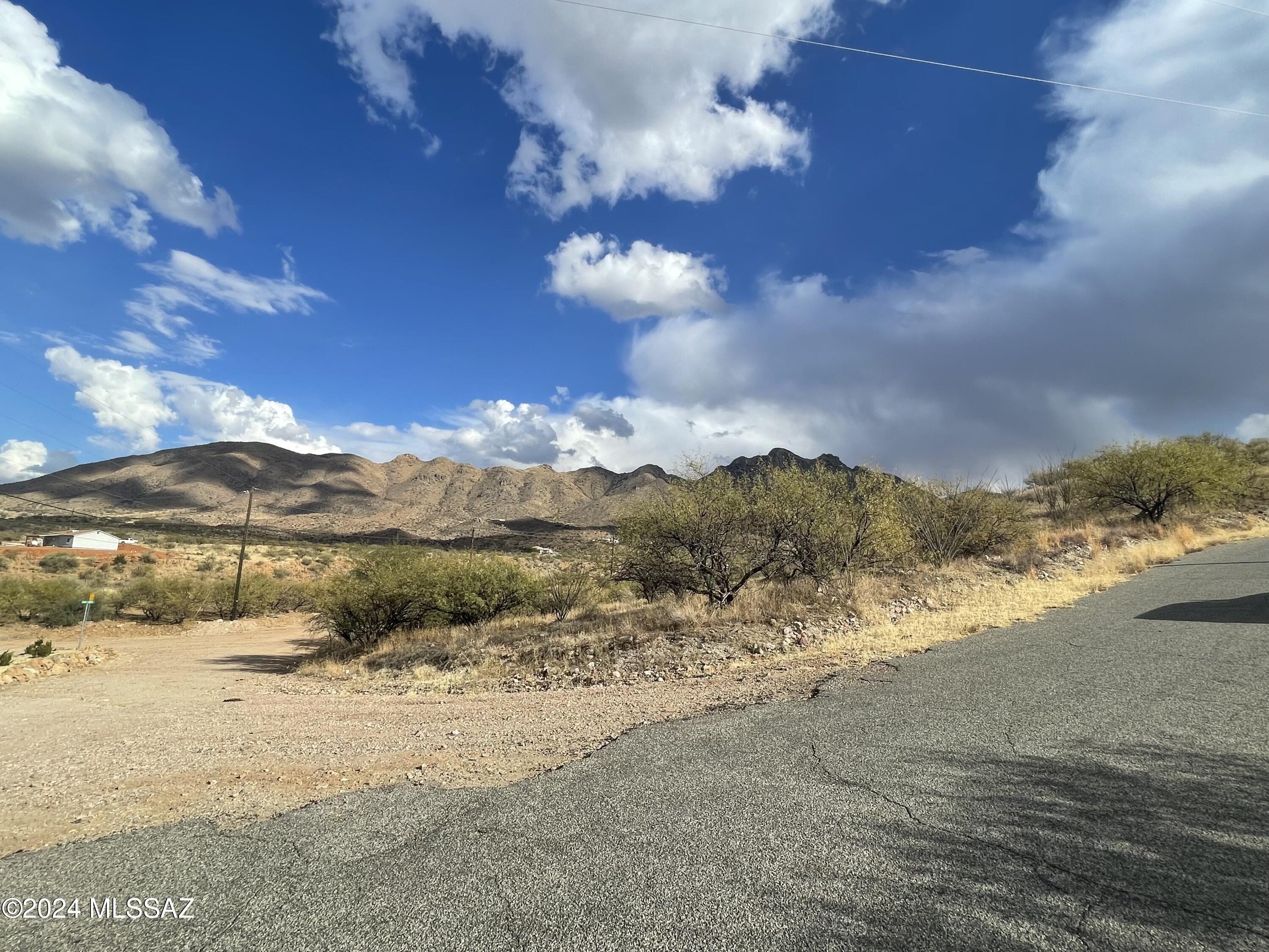 1584 Camino Esturion, Unit 1 Rio Rico, AZ 85648 - Photo 5 of 8 a view of a lake with a beach