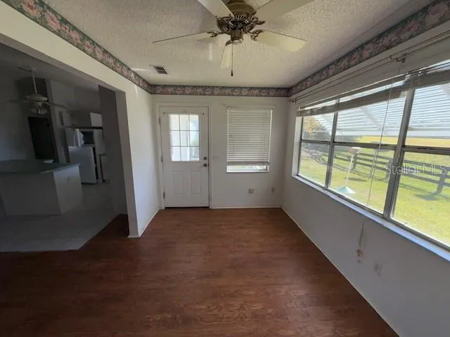 a view of an empty room and window