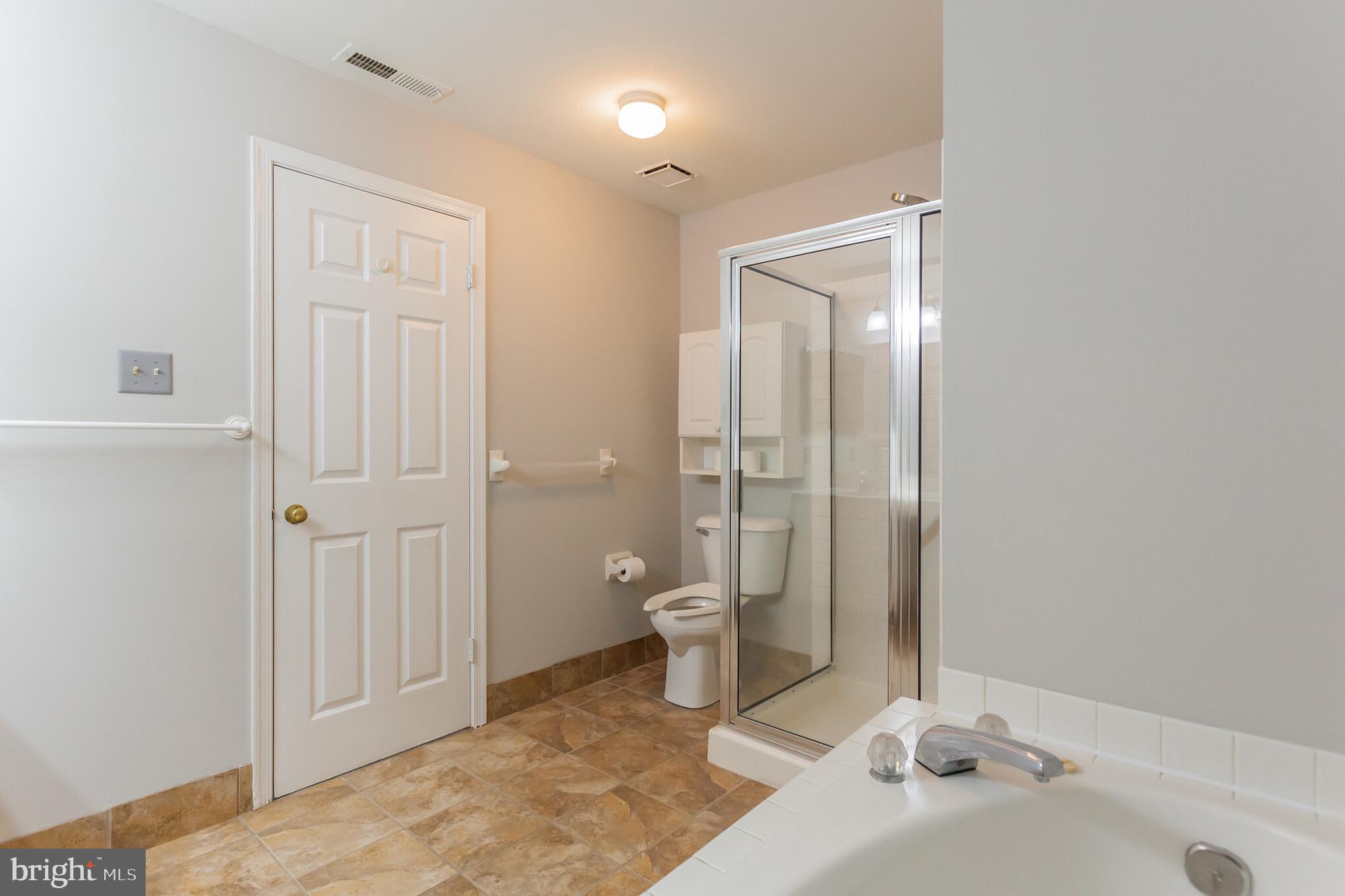 1908 Sterling Road, Unit 7 Yardley, PA 19067 - Photo 26 of 30 Stall shower with grab bars