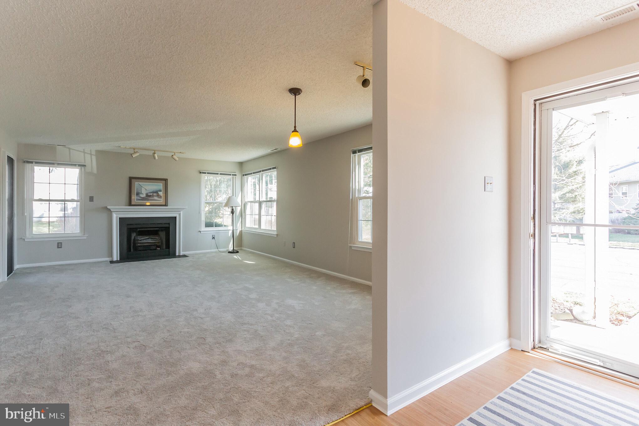 1908 Sterling Road, Unit 7 Yardley, PA 19067 - Photo 5 of 30 Huge great room with fireplace