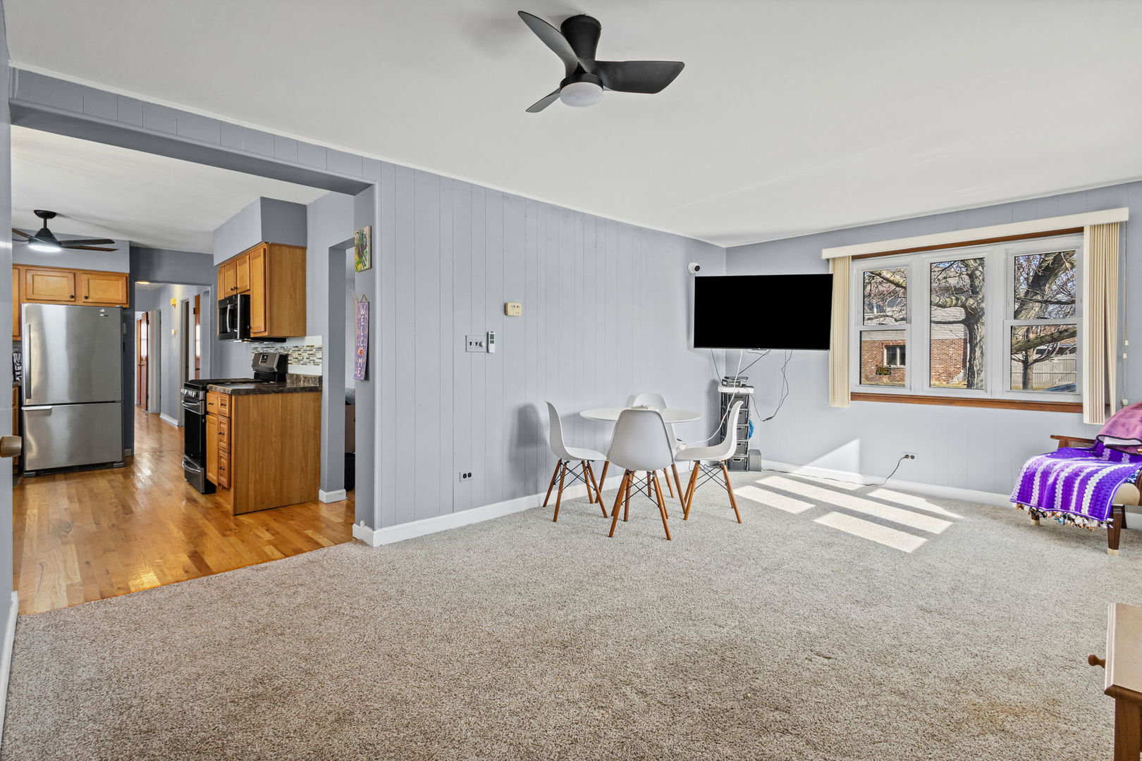 5901 108th Place Chicago Ridge, IL 60415 - Photo 3 of 15 a living room with furniture and a flat screen tv