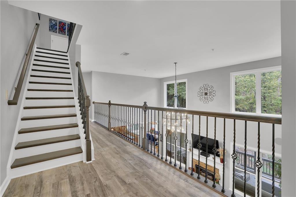 6010 Anchorage Quay Cumming, GA 30041 - Photo 46 of 72 a view of entryway with stairs and wooden floor