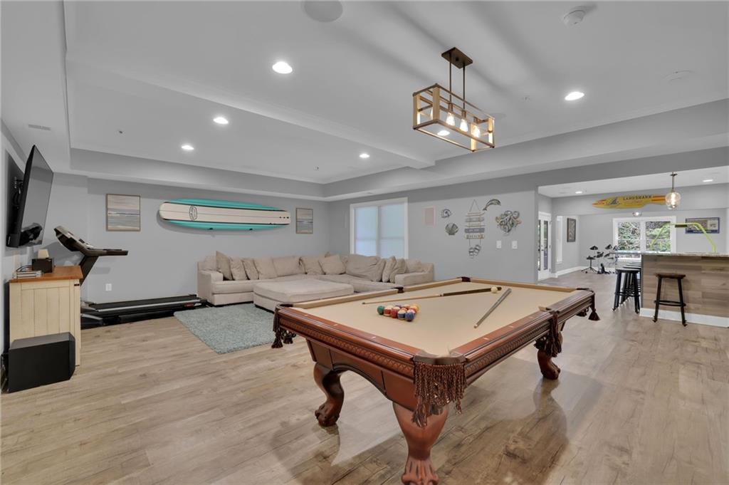 6010 Anchorage Quay Cumming, GA 30041 - Photo 59 of 72 a view of a room with gym equipment