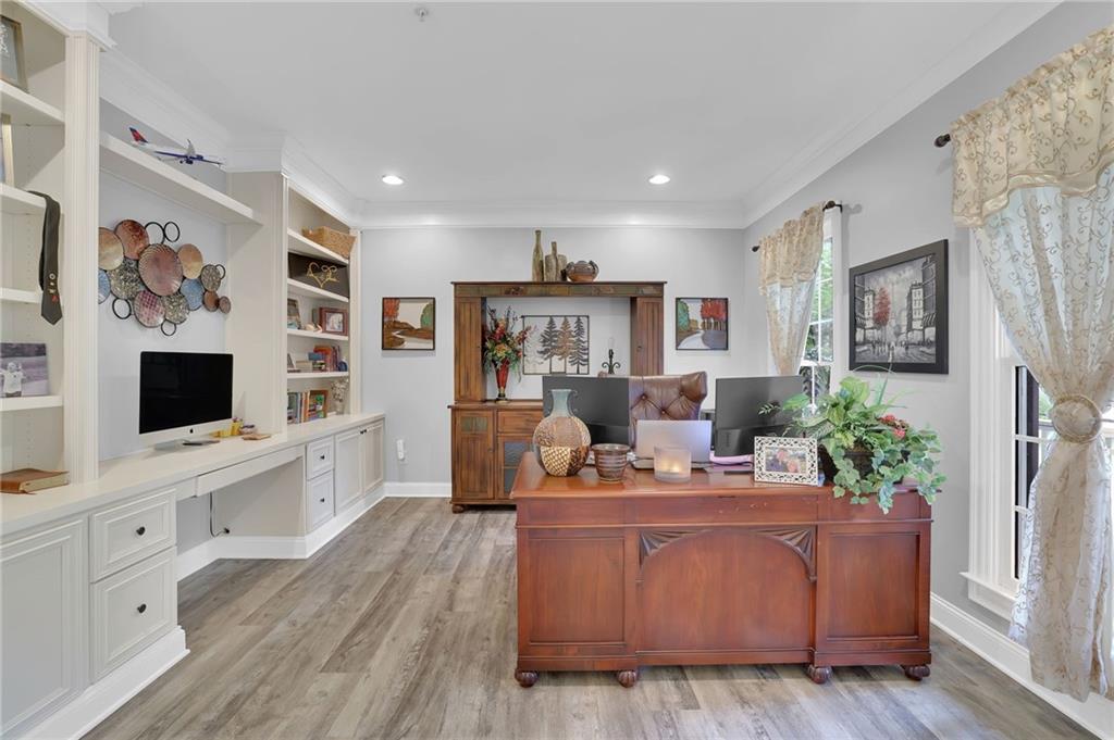 6010 Anchorage Quay Cumming, GA 30041 - Photo 6 of 72 a living room with furniture and a flat screen tv