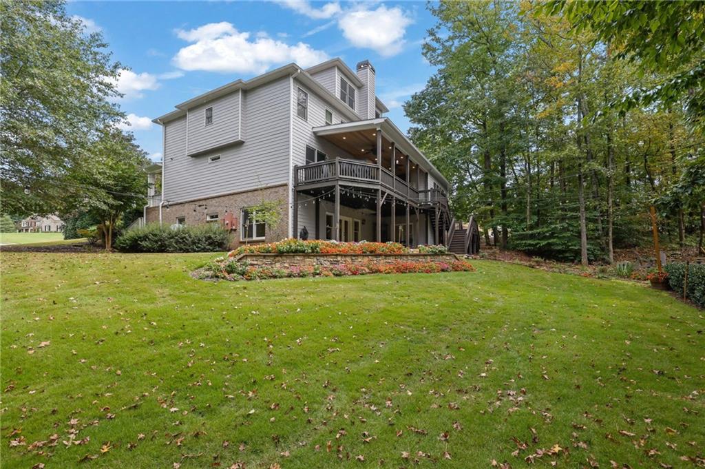 6010 Anchorage Quay Cumming, GA 30041 - Photo 66 of 72 a front view of a house with garden
