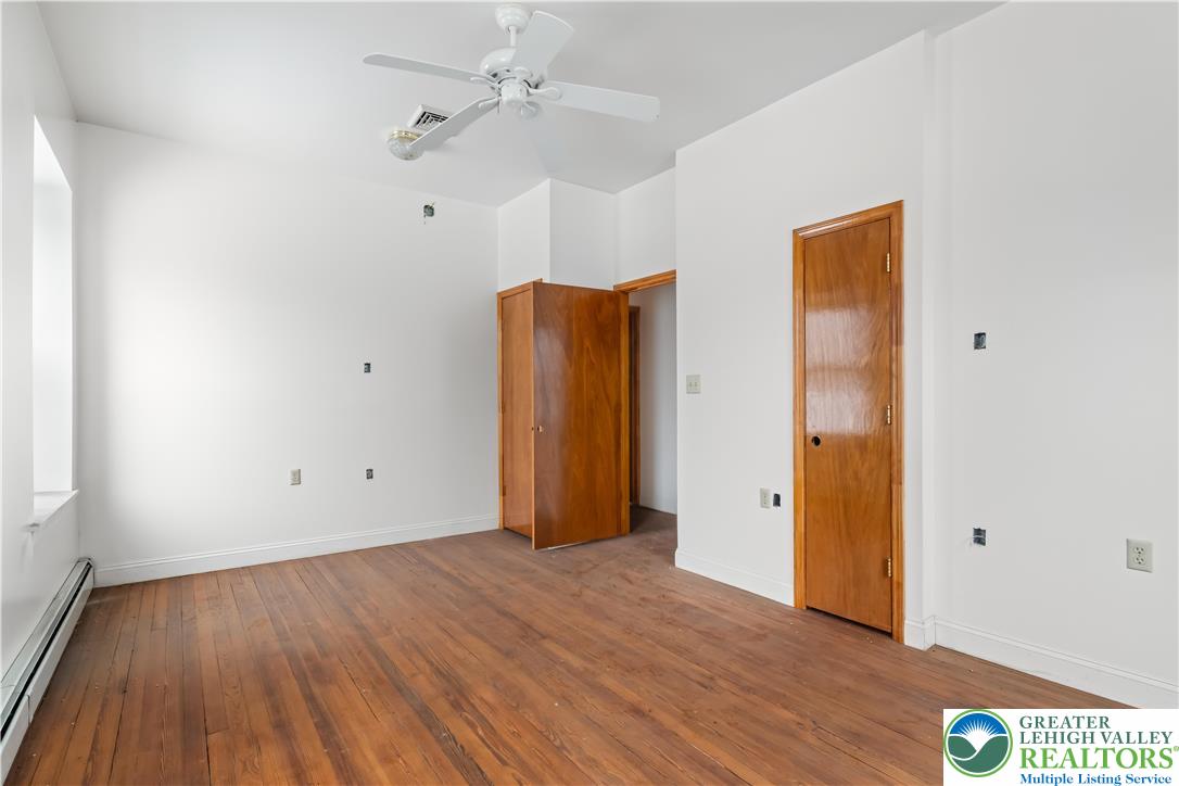 384 Evansville Road Fleetwood, PA 19522 - Photo 20 of 54 a view of an empty room with wooden floor